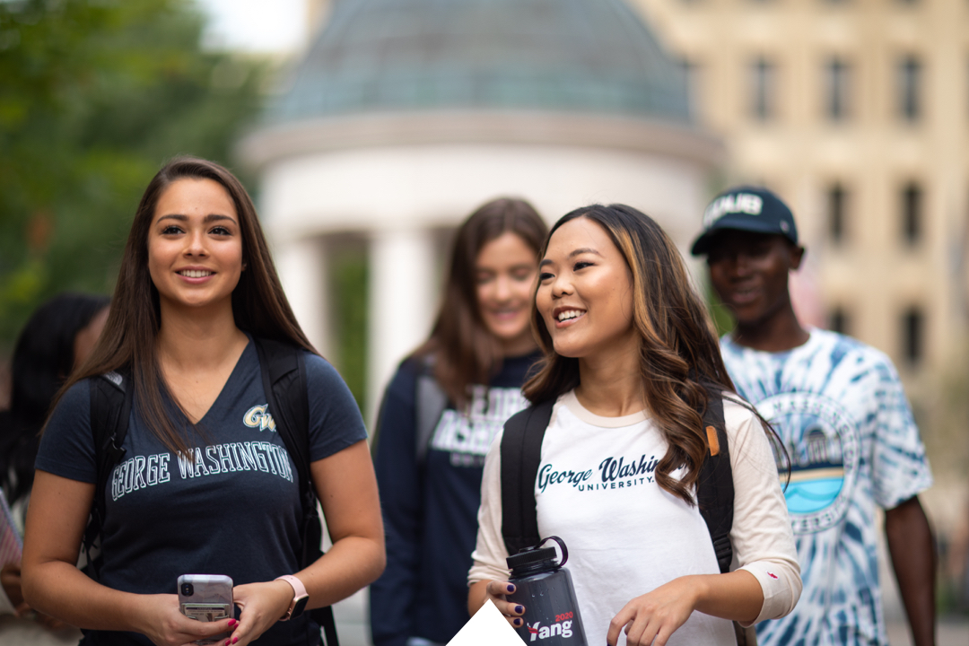Group of students walking through Kogan Plaza