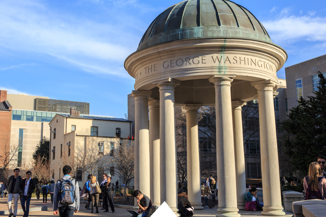 The tempietto surrounded by students sitting and walking 